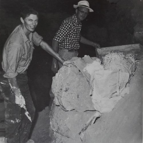 Members of Ralph Solecki’s team, Dr T. Dale Stewart (right) and Jacques Bordaz (left) at Shanidar Cave in 1960, working on removing the remains of Shanidar 4 (the ‘flower burial’). Credit: Ralph Solecki